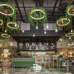 the interior of a restaurant with green plants hanging from the ceiling and wooden bar stools