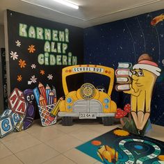 the school bus is painted on the wall in the hallway, and it's colorful