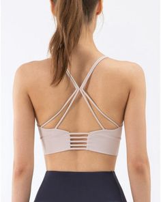 The EMES SHOP bra is detailed with a scoop neckline. Features a doublethin straps. and crosses over in the back. This buttery soft. light-weight. breathable sports bra tank is perfect for your next yoga class. morning run. afternoon hike. or trip to the gym.MATERIAL:73% Nylon 27% SpandexMEASUREMENTS:Small : 4-6 Waist: 25-26.5 in Chest: 33-34.5 inMedium : 6-8 Waist: 26.5-28 in Chest: 34.5-36 inLarge : 8-10 Waist: 28-29.5 in Chest: 36-37.5 inX-Large : 10-12 Waist: 29.5-31 in Chest: 37.5-39 in Strappy Sports Bra With Light Support And Stretch, High Stretch Light Support Sports Bra With Cross Back, Stretch Strappy Sports Bra For Light Exercise, Strappy Stretch Sports Bra For Pilates, Breathable Strappy Sports Bra For Light Exercise, Strappy Back Activewear For Light Exercise, Stretch Strappy Sports Bra For Pilates, Stretch Sports Bra With Straps For Pilates, Stretch Sports Bra For Pilates