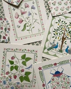 several cards with birds and flowers on them