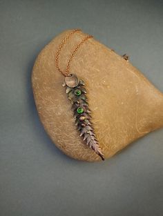 Handcrafted Long Fern Necklace, a stunning piece of elven jewelry that will elevate your style to mystical realms. This unique necklace features an electroformed copper pendant, showcasing intricate fern details that bring the beauty of nature closer to your heart. Each pendant is skillfully handcrafted, making it a one-of-a-kind accessory that will surely turn heads and spark conversations. Embrace your inner forest spirit with this ethereal necklace and add a touch of magic to your everyday look. → Size: 7*1.3cm → Have questions? Need other quantity / customization / other questions? - Contact me Bronze Metal Fantasy Necklace, Fantasy Style Bronze Metal Necklace, Fantasy Copper Jewelry As Gift, Hand Cast Copper Pendant Necklaces, Handmade Fantasy Necklaces For Larp, Hand Cast Copper Pendant Necklace, Hand-forged Copper Nature-inspired Jewelry, Bronze Nature-inspired Pendant Necklace, Nature-inspired Hand Forged Copper Necklace