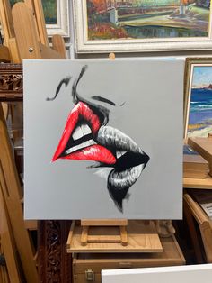 a painting of a woman's mouth with red and black lipstick painted on it