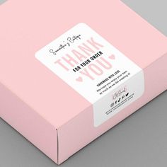 a pink thank you card box on a gray background