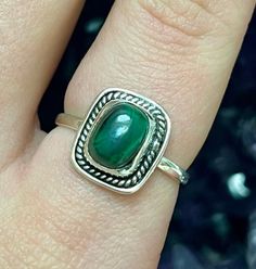 This listing is for a single 925 Rectangle Rope Malachite Sterling Silver Ring. A few options are pictured to show the natural variation in the stone.  Malachite is an opaque stone that is a light green to deep green hue. It is found in a unique banded pattern. The bands are white and green and run in parallel streaks. This stone was discovered around 4,000 BC. Malachite translates from Greek to mean mallow, a green leafy herb. Malachite is believed to provide protection to travelers. It has been called the mirror of the soul, because it reflects the inner feelings of a person positive or negative. This stone is able to reflect ones true emotions, therefore, Malachite represents Protection and Reflection. Heart Chakra: The Heart Chakra brings hope and forgiveness to everyday life. When thi Spiritual Malachite Jewelry For Healing, Silver Malachite Necklace With Natural Stones, Green Malachite Rings With Polished Finish, Handmade Silver Malachite Rings, Green Malachite Spiritual Jewelry, Green Stone, Deep Green, Crystal Rings, Heart Chakra