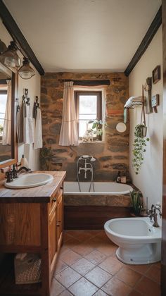 a bathroom with two sinks and a bathtub