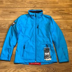 New With Tags Excellent Condition, Stored In Pet/Smoke Free Home. Never Worn Color: Frozen Blue Size: S Polartec Fleece-Lined Dwr Helly Tech Waterproof Protection Bluesign Approved Fabric Hip Length Note: Color Is Slightly More Turquoise To The Eye Than Pictures Show. The Stock Photo At The End Shows More Of The True Color. No Matter What Light We Tried It Came Out The Same Way! It’s A Beautiful Color Though! Functional Blue Outerwear For Work, Blue Functional Outerwear For Work, Frozen Blue, Helly Hansen Jacket, Long Winter Jacket, Black Ski Jacket, Winter Coat Parka, Purple Coat, Ski Girl