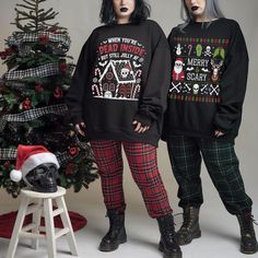 *EACH SHIRT SOLD SEPARATELY*  - "PANTS AND ACCESSORIES NOT INCLUDED" Celebrate the holidays together with a spooky twist! Our matching gothic holiday sweatshirts are perfect for groups who love a blend of dark humor and festive cheer. Whether it's for family gatherings, friends, or holiday parties, these cozy unisex designs will keep everyone looking jolly and a little scary. Available in multiple and plus sizes to suit everyone in the group--perfect for holiday photos and making unforgettable memories! Order yours today! All of our sweatshirts are custom made to order ► ITEM DETAILS: * Classic unisex crewneck sweatshirt * Ribbed knit collar with seam - Ribbed knit makes the collar highly elastic and helps retain its shape * Fabric blends: medium-heavy fabric blend of 50% cotton and 50% po Emo Christmas Outfits, Grunge Christmas Outfit, Goth Christmas Outfit, Goth Christmas Aesthetic, Spooky Christmas, Matching Ugly Christmas Sweaters, Ugly Christmas Sweater Couples, Jolly Af, Scary Christmas