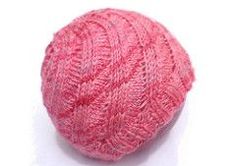 a pink knitted ball on a white background