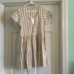 Nwt Rylee + Cru Size Xs Tan And Cream Striped Dress Chic Relaxed Fit Striped Dresses, Casual Neutral Cotton Midi Dress, Casual Neutral Midi Dress For Spring, Beige Flowy Casual Mini Dress, Flowy Beige Casual Mini Dress, Casual Flowy Beige Dress, Casual Beige Flowy Dress, Cream Casual Cotton Mini Dress, Casual Cream Cotton Mini Dress