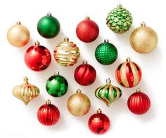 an assortment of christmas ornaments arranged in rows