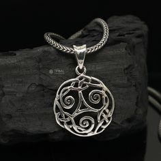 Metal-925 sterling silver Item Type- Pendant Weight-4.630 grams. Height-4 centimetre. Width-2.7 centimetres. Stamped-925. Finish-Oxidized. CHAIN DETAILS: Chain width-1.5mm(if buy) Weight-12.500 to 18.500 grams(weight vary as per length) Chain Type-screw chain/ pendant chain. Thank You and Happy Shopping! Spiral Shaped Sterling Silver Jewelry, Symbolic Sterling Silver Locket Necklace, Spiral Jewelry With Intricate Design For Gift, Engraved Sterling Silver Spiral Jewelry, Spiral Sterling Silver Necklace In Silver, Symbolic Spiral Sterling Silver Jewelry, Spiral-shaped Engraved Sterling Silver Jewelry, Viking Sterling Silver Pendant Jewelry, Viking Style Sterling Silver Pendant