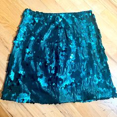 Beautiful Skirt That Is Perfect For A Party Nwot Size Small Has Some Stretch And A Zipper On The Side Green Pencil Mini Skirt For Party, Blue Sequined Skirt For Spring, Blue Sequined Mini Skirt For Spring, Blue Sequin Skirt For Night Out, Blue Mini Skirt For Party Season, Blue Lined Skirt For Party, Blue Sequined Mini Skirt For Party, Blue Fitted Mini Skirt For Party Season, Fitted Blue Mini Skirt For Party Season