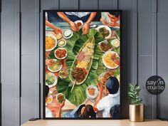 a painting on the wall above a table filled with food