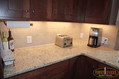 a toaster oven sitting on top of a kitchen counter