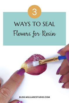 Hand holding a paint brush and painting a seal coat on a red rose petal. The graphic overlay reads "3 ways to seal flowers for resin". How To Make Resin Flower Jewelry, Flower Petal Resin Jewelry, Flower Petal Resin Earrings, Preserve Flowers Resin, Resin Coated Flowers, Rose Petals In Resin, Drying Flowers For Resin, Preserving Flowers In Resin Diy, Dry Flowers Resin