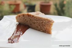 a piece of cake sitting on top of a white plate