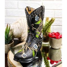 This cowboy/cowgirl boot sculpture is made of high-quality polyresin, hand-painted, and polished individually. Union Rustic | Union Rustic Bunkley Sculpture 7.0 H x 6.25 W x 2.5 D in black / blue / whiteResin in Black;green | 7" H X 6.25" W X 2.5" D | Wayfair | Home Decor Boot Bouquet, Flower Bouquet Vase, Black Cowboy Boots, Cowgirl Boot, Black Cowboy, Cowboy Cowgirl, Floral Vine, Cowboy Boot, Cowboy And Cowgirl