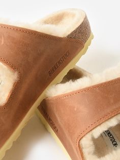 DESCRIPTION:Oiled nubuck leather sandal with a plush shearling lining and oversized buckles.FEATURES:Upper: Nubuck LeatherAdjustable Double BucklesAnatomically Shaped FootbedRound ToeFootbed Lining: ShearlingFootbed: CorkSole: EVA Leather Sandals With Faux Fur Lining, Shearling Open Toe Sandals With Removable Insole, Round Toe Sandals With Faux Fur Lining In Shearling, Shearling Sandals With Faux Fur Lining And Round Toe, Winter Shearling Sandals With Round Toe, Shearling Open Toe Sandals With Cushioned Footbed, Arizona Big Buckle, Birkenstock Women, Saint Bernard