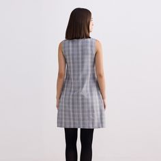 Effortlessly elevate your wardrobe with our sophisticated shift dress in cotton tweed, a timeless piece designed to bring a touch of nostalgia and charm to any occasion. The gentle A-line finish of this button-down dress and its side pockets, coupled with the delicate detailing across the waistline is just what you need to stylishly make it through your day. Wash in cold water or dry clean only, Do not soak bleach or wring, Line dry in shade, Iron inside out on low heat Travel Pants Women, Travel Skirt, Vacation Outfits Women, Tweed Shift Dress, Womens Dress Tops, Formal Wear Women, Travel Clothes, Travel Clothes Women, Stocking Fillers For Her