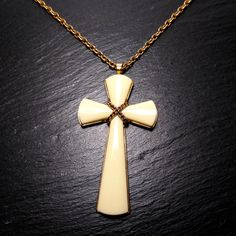 Vintage large Christian cross pendant with chunky chain by AVON. The pendant is decorated with ivory color plastic elements. Material: gold tone metal, plastic Mark: AVON (on chain) Condition: excellent vintage condition Christian Cross, Religious Jewelry, Ivory Color, Gold Tone Metal, Cross Pendant, Etsy Vintage, Arrow Necklace, Jewelry Necklace Pendant, Gold Tones