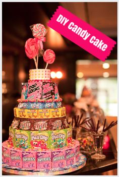 there is a cake made out of candy and lollipops