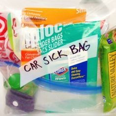 the contents of a car sick bag are wrapped in plastic and labeled with stickers