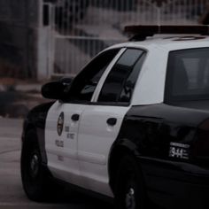 a police car is parked on the street