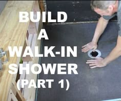 a man is working on a walk in shower with the words build a walk in shower part 1