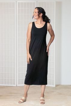 Habitat's the "One" Everything Dress is an elegant long tank dress in a stretch knit that hugs the curves. A simple and classic tank dress that falls long to about mid-calf on most. A modest scoop neck line with wide strap. No pockets. Made in ChinaFabric: 95% Rayon, 5% SpandexCare: Machine Wash, Tumble Dry See Habitat's Sizing guideline here >Measurements - Approximate, measured flat and unstretched: Small (S): Bust 36", Hips 40", Length 47.5"Items pictured are a size small on a size 6 dress fo Long Tank, Size 6 Dress, Wide Straps, Black Charcoal, Tank Dress, Mid Calf, The One, Scoop Neck, Slip Dress