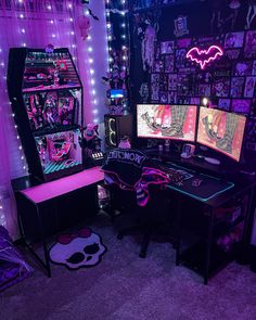 a room filled with two computer monitors sitting on top of desks covered in neon lights