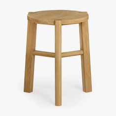 a wooden stool on a white background with no people in the room to see it