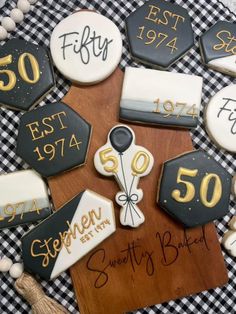 decorated cookies with 50th and fifty on them