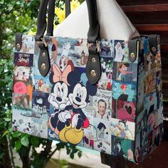 Introducing the Disney Mickey Minnie Memories Leather Handbag, a timeless accessory that effortlessly combines style and nostalgia. Crafted from premium Mickey Mouse Quilt, Leather Bag Tag, Hawaiian Shirt Women, Timeless Accessories, Mickey Minnie, Everyday Items, Custom Leather, Printed Leather, Bag Tags