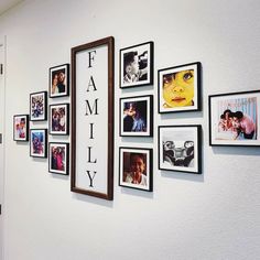 a white wall with many framed pictures on it and the words family hanging above them