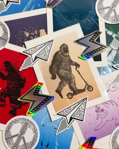 many different colored stickers on top of each other with an image of a bigfoot