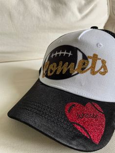 Show your support for your favorite football player or players with this super cute custom trucker hat. Can customize with a variety of colors for the team name and in the heart. Choose the team name color as the primary color and the heart color as the secondary color. Custom Trucker Hats, Spirit Shirts, Custom Football, Team Name, Football Player, Team Names, Winter Hat, Trucker Hats, Football Players