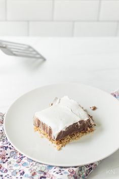 a piece of cake sitting on top of a white plate