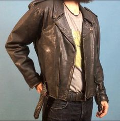 "Vintage 90's black leather motorcycle jacket designed by Polarpels, Norway Snap down collar, lapels and shoulder epaulets Traditional zippered sleeve cuffs Attached half belt with heavyweight nickel plated square buckle Three outside zippered pockets plus small functional coin flap pocket One interior pocket Fixed nylon insulated lining Jacket exterior is in great condition with minimal wear (one snap on left collar broken) Jacket interior is in great condition Labels are intact Name on label - Leather Biker Jacket For Alternative Fashion, Winter Biker Jacket With Belt Loops, Long Sleeve Biker Jacket With Belt Loops, Biker Style Leather Outerwear For Alternative Fashion, Vintage Black Biker Jacket For Alternative Fashion, Biker Jacket With Belt Loops, Biker Jacket With Belt Loops For Biker Events, Black Leather Motorcycle Jacket, Leather Motorcycle Jacket