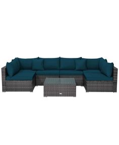 an outdoor sectional sofa with blue cushions and coffee table in front of a white background