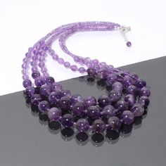 PRODUCT DETAIL :ITEM : PURPLE AMETHYST BEADED NECKLACEITEM CODE :  DGC3037ITEM NAME :NECKLACEGEMSTONE :  PURPLE AMETHYSTBEADS SHAPE : SMOOTH ROUNDLENGTH :   17"-19" INCH APPROXBEADS SIZE:  3mm/6-12 MM ApproxWEIGHT :  431 Cts. APPROXCUSTOMIZATION/BULK ORDER : AVAILABLEPLEASE FEEL FREE TO CONTACT IF YOU REQUIRE ANY FURTHER INFORMATION. Luxury Briolette Beaded Necklace With Polished Beads, Cheap Lavender Beaded Necklaces For Gifts, Cheap Oval Gemstone Beads Necklaces, Luxury Oval Beads Beaded Necklace For Gift, Purple Amethyst Bead Jewelry, Purple Round Bead Gemstones For Gifts, Purple Polished Round Bead Jewelry, Amethyst Round Beads For Jewelry Making, Adjustable Amethyst Round Bead Gemstones