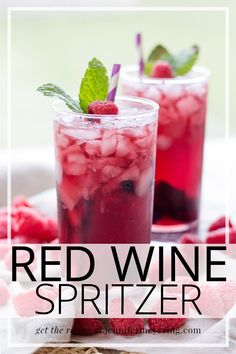 red wine spritzer with raspberries and mint garnish in glasses