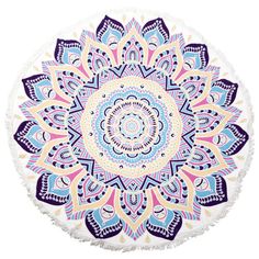 a round beach towel with an ornate design