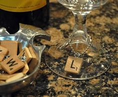 Yet another super simple wine charm tutorial! These little guys are so easy and inexpensive to make. Scrabble Tiles Diy, Scrabble Crafts, Wine Decor, Diy Tile, Wine Tags, Scrabble Tiles, Wine Glass Charms, Homemade Christmas Gifts, Wine Charms