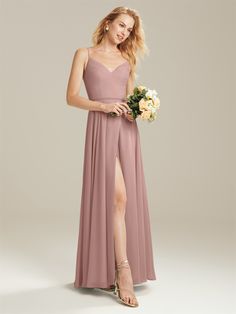 a bridesmaid wearing a long, dusty pink dress with thigh - high slit