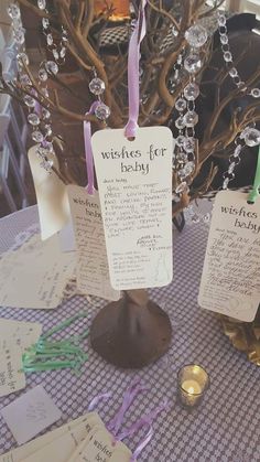 a table topped with lots of cards and candles