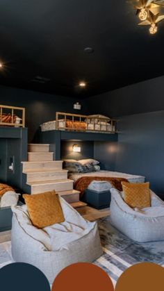 a room with bunk beds and couches in the middle, two chairs on the other side