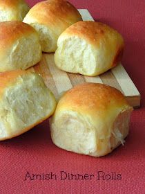 several pieces of bread sitting on top of a red cloth