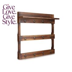 a wooden shelf with three hooks on it and the words give love, give style