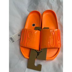 Bright Citrus Orange Slides. Synthetic And Rubber, Sole Material Is Foam. Box Is Not Included. Casual Orange Flat Slides, Jordan Mids, Jordan Orange, Jordan 4’s, Jordan Retro 12, Black Athletic Shoes, Red Jordans, Shoes Jordan, Womens Air Jordans