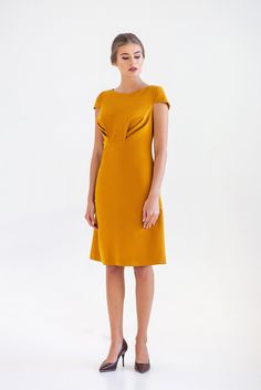 "A midi mustard dress featuring a line silhouette, draped bodice and cap sleeves. - draped bodice - a line silhouette - cap sleeves - scoop neck - knee length (midi) - two pockets in side seams - premium italian fabric Color: yellow (mustard) Fiber: viscose - 60%, elastan - 5%, polyester - 35% Concealed back zipper closure For Size S (6 US): dress length - 39\" (101,5 cm) Our model wears size S (US 6) and is 171 cm/5'6\" tall. You may feel free choosing the size. Just send us your measurements ( A-line Midi Dress With Draped Sleeves For Formal Occasions, Elegant Yellow Midi Dress With Fitted Bodice, Fitted A-line Midi Dress With Draped Sleeves, A-line Midi Dress With Pleated Back, Spring Cap Sleeve Ruched Dress, Fitted Dress With Pleated Back And Cap Sleeves, Ruched Cap Sleeve Dress For Spring, Spring Ruched Dress With Cap Sleeves, Elegant Ruched Dress With Cap Sleeves